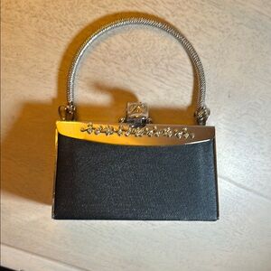 Elegant Black Handbag with Silver Accents Mira Collection